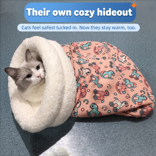 Their own cozy hideout: cat peeking out of the pink sleeping bag